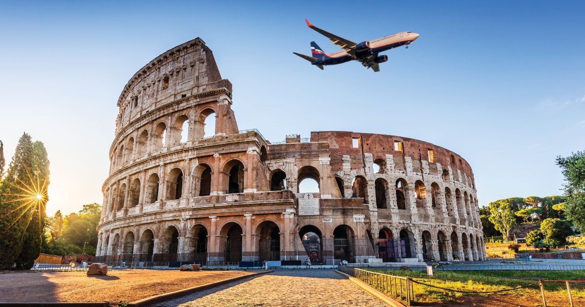 flight flying over The Colosseum
